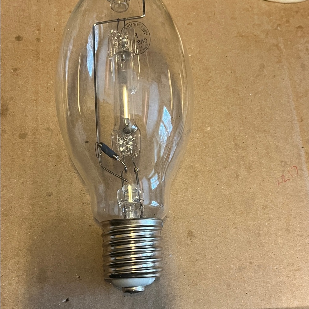 Clear Light Bulb with Silver Base
R 1203 Caster large size bulb Vintage